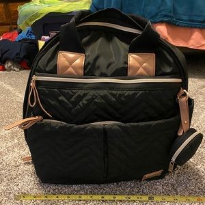 SkipHop Suite Up 6 in 1 backpack style diaper bag